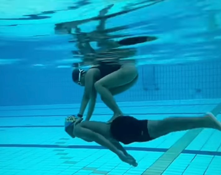 Sharon teaching underwater