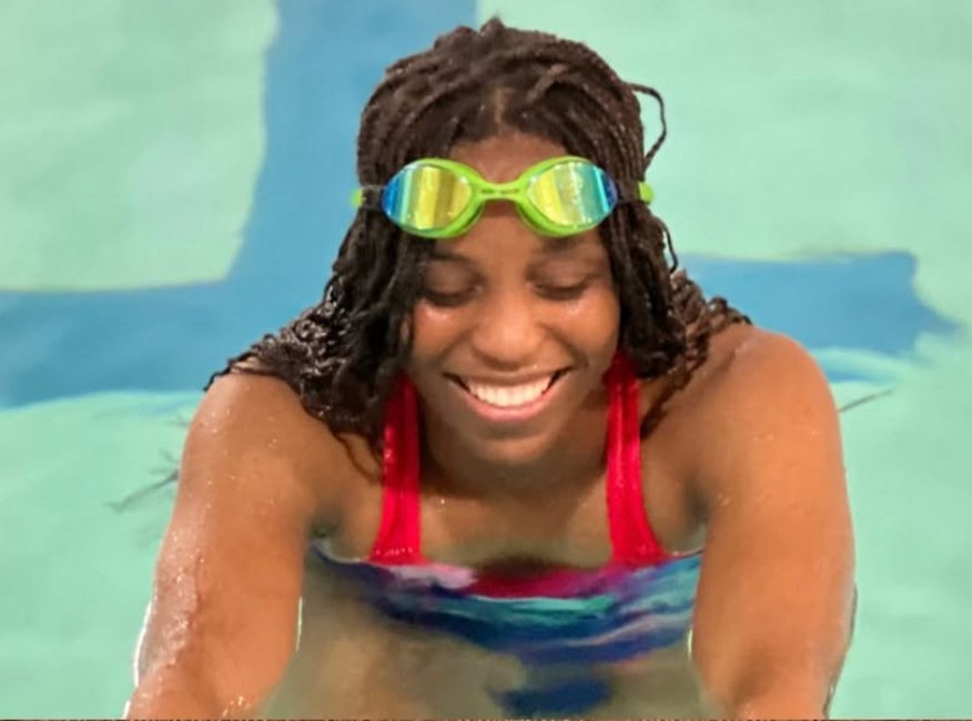 Sharon smiling at pool